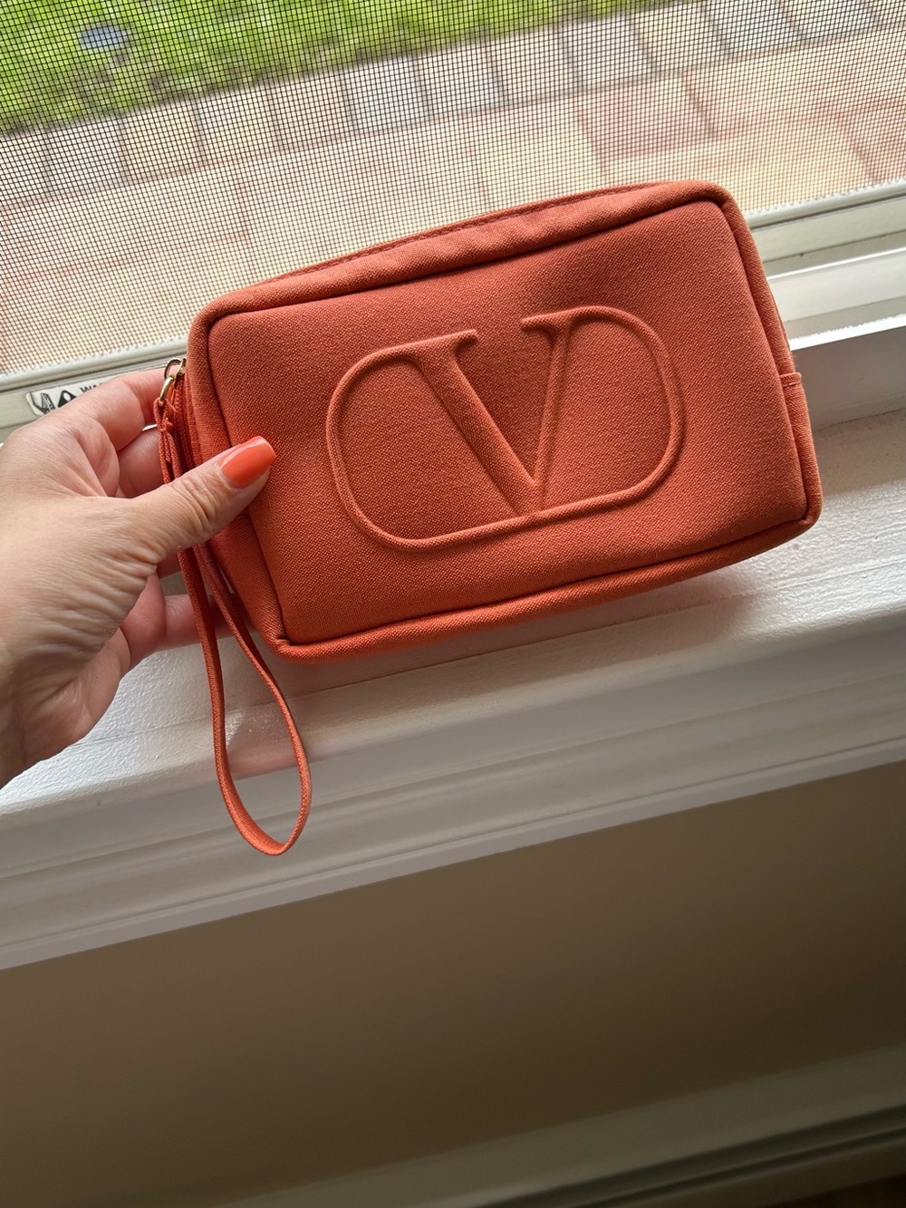 Valentino Orange Embossed V Wristlet Pouch
